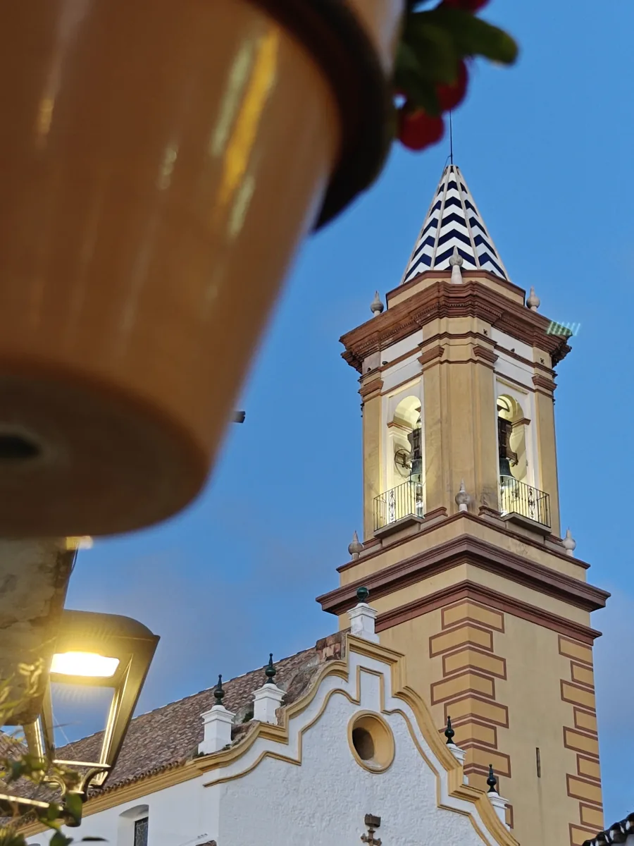 The bell tower of the church Nuestra Señora de los Remedios in Estepona, at dusk